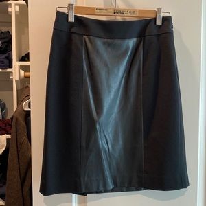 Black pleather pencil skirt. Goes great with white button down also for sale